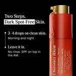 Red serum bottle with gold cap on a black background, featuring text about its use.